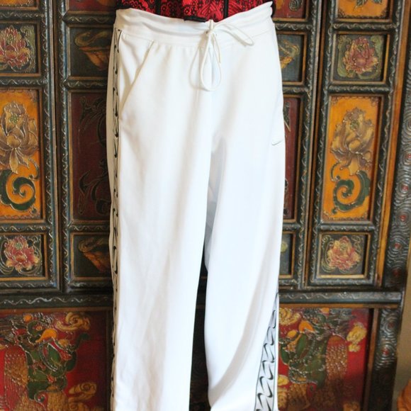 Nike Pants & Jumpsuits Nike Womens Loose Fit Design Swoosh Pants